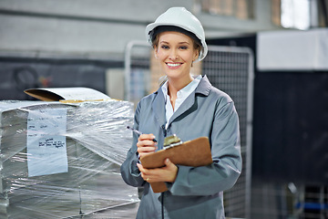 Image showing Logistics, portrait and woman in warehouse with clipboard for quality control, inventory or freight distribution. Hardhat, inspector or wholesale supplier with stock checklist or smile for inspection