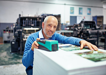 Image showing Printing, factory and portrait of man with paper for quality control, design or product inspection. Warehouse, printer workshop and person for logistics, manufacturing and industrial production