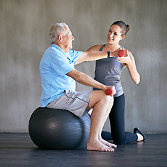 Image showing Personal trainer, dumbbells and smile of senior man on ball for fitness or rehabilitation at gym on mockup. Elderly person, weightlifting and physiotherapist help for body health or physical therapy