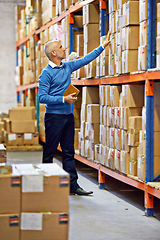 Image showing Boxes, shelf or man in warehouse for stock or logistics info for a delivery order on tablet in factory. Check, inventory or mature manager with product, package or cargo shipping for distribution