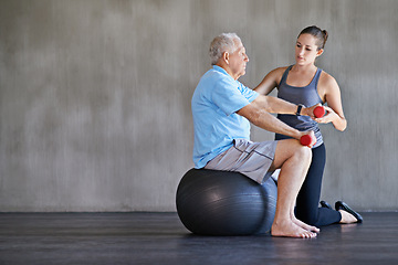 Image showing Physical therapy, dumbbells and elderly man on ball for fitness, rehabilitation or exercise at gym on mockup. Senior person, weightlifting and personal trainer help for body health or physiotherapy