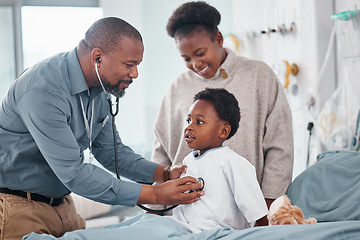 Image showing Doctor, hospital and child with breathe, checkup and consultation for lung health and wellness. Pediatrician, kid and clinic bed with bear, comfort and good news for healthcare and life insurance