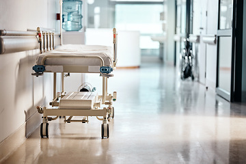 Image showing Ward, hospital and bed in a lobby, healthcare or wellness with furniture or interior with help or risk. Hallway, clinic or emergency service with surgery or medical center with bacteria or facility