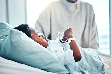 Image showing Medical, sick and child in bed in hospital for recovery of surgery, illness or diagnosis. Healthcare, healing and young African kid patient resting for injury or virus treatment in pediatric clinic.