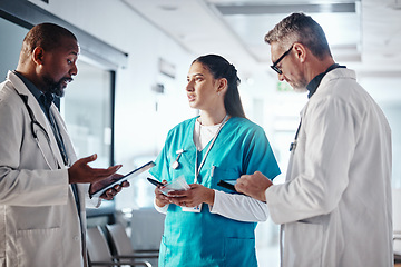 Image showing Clinic, teamwork and doctor with folder, conversation and brainstorming for healthcare and help. Medical, leader and senior professional with group, advice or meeting with documents or administration