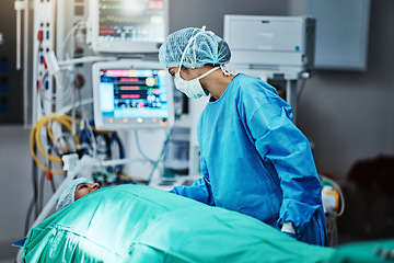 Image showing Talking, surgeon and patient in emergency surgery, professional care and hospital bed for support. Speaking, help and doctor with person in operation or mask to check healthcare in medical results