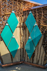 Image showing Small solar panels for solar energy installed on a wall of public park pavillon, photovoltaic, alternative electricity source