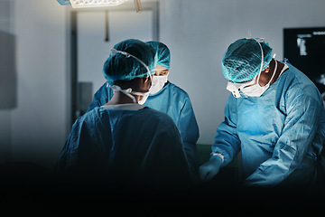 Image showing Surgeon team, people and operating room at hospital in scrubs, ppe and help for emergency healthcare procedure. Doctors, group and together in icu, medical surgery and services for wellness at clinic