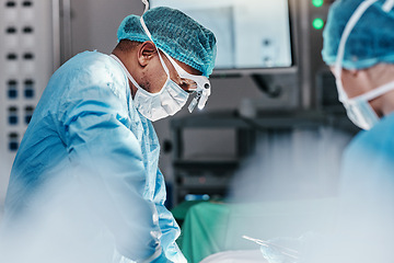 Image showing Doctor, surgeon and healthcare worker in hospital, theater and emergency room busy with operation in medical career. Male person, professional and medic with staff for surgery, medicine and health