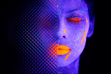 Image showing Face, neon and surreal paint for creative, art and glitter for unique psychedelic glow. Person, science fiction or color for pixel, particle and dissolving uv illusion for mystical fluorescent trance