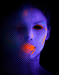 Image showing Face, neon and creepy paint for creative, art and glitter for unique psychedelic glow. Person, science fiction or color for pixel, particle and dissolving uv illusion for mystical fluorescent trance