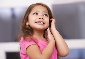 Image showing Home, thinking and face of girl with ideas for question, solution and wondering with doubt alone. Knowledge, planning or happy child in concentration to daydream or imagine or learning in a house