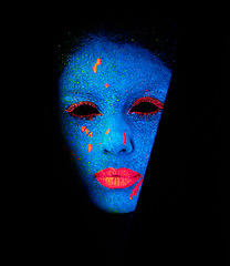 Image showing Face, neon and creepy paint for creativity, art and glitter with unique surreal glow. Person, science fiction and color with dream, rave and abstract uv illusion for mystical fluorescent trance