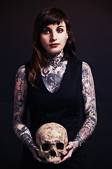 Image showing Skull, tattoo or portrait of woman in studio for fashion isolated on black background for edgy style. Bones, hope or cool female punk model with ink for unique art, aesthetic or creative expression