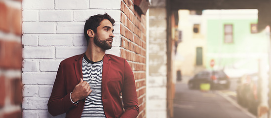 Image showing Man, fashion and confident with chilling in city, trendy style with pride and cool outdoor. Urban, unique and stylish with designer clothes, edgy and chic with blazer or jacket for casual apparel