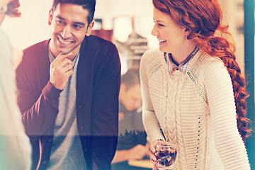 Image showing Happy people, drinking and laughing with team for funny joke, humor or discussion at office. Young man and woman with smile or beverage in planning, creative startup or strategy together at workplace