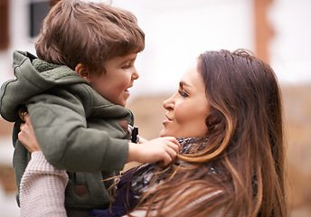 Image showing Mother holding son, outdoor and family with happiness, kid and bonding together with weekend break. Love, single parent and childhood with joy and playing with fun and vacation with mama and boy