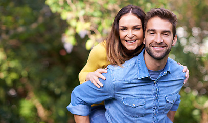 Image showing Portrait, woman and man with piggyback in nature or park for bonding, dating and relationship with smile. Couple, love and romantic in backyard or outdoor with joy, excited and commitment in marriage