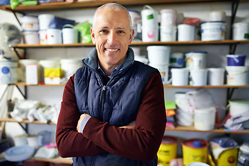 Image showing Portrait, man and confidence of happy store owner in business or retail for plastic in startup. Face, arms crossed and mature professional in shop, entrepreneur and smile of manager in Switzerland