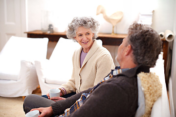 Image showing Senior couple, coffee or couch to relax in conversation of happy, memory or bonding together. Older woman, man or tea on sofa to talk, plan or thinking of dream retirement vision in living room