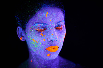 Image showing Face, neon and psychedelic glitter for creative, art and paint with unique surreal glow. Person, science fiction and color with dream, rave and abstract uv illusion for mystical fluorescent trance