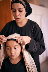 Image showing Mother, girl and muslim with help, headscarf and support for eid celebration and culture. Islamic family, kid and bonding together for love, growth and childhood with parenting and traditional hijab