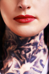 Image showing Closeup, red lipstick and woman with tattoos, makeup and culture with rebel and confident. Person, mouth and product with ink and artistic with tradition and design with pattern and shine with glow