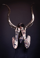 Image showing Horns, demon and woman with tattoo in studio for dark magic, horror or artistic aesthetic with mask. Creative nightmare, halloween culture or unique female person with scary bones on black background