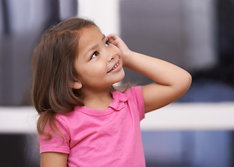 Image showing Smile, thinking and face of girl with ideas for question, solution and wondering with doubt alone. Knowledge, planning or female child in concentration to daydream or imagine or learning in a house