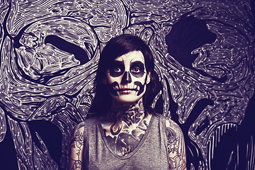 Image showing Skull, makeup and portrait of woman with pattern for festival, Halloween and day of the dead. Creative, costume and person with face paint for horror, scary and gothic aesthetic in studio background