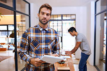 Image showing Portrait, writing and business man with notepad in office for ideas, planning or research on creative project. Startup, entrepreneur and serious employee by book for strategy, schedule or inspiration