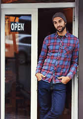 Image showing Small business, restaurant and portrait of man with sign at entrance of cafe with smile. Open, confidence and entrepreneur at coffee shop with career in service, hospitality and happiness at door