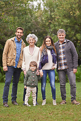 Image showing Family, grandparents and parents with child in portrait for bonding, happiness and picture in park. Outdoor, nature and old people with mother or father and kid for weekend or holiday together