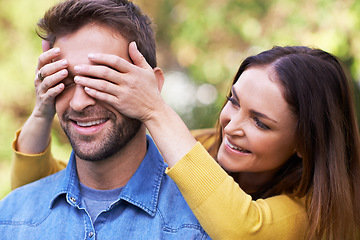 Image showing Happy couple, man and woman with surprise in park for anniversary, bonding and dating in relationship. People, love and romantic in backyard with smile or joy, excited and commitment in marriage