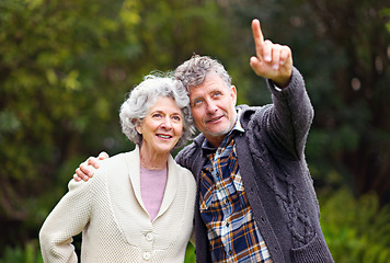 Image showing Retired people, pointing or love to relax in garden by thinking, walking or planning happy holiday. Couple, vision or rest in nature park as conversation, happiness or memory of retirement dreams