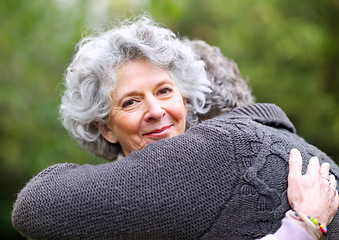 Image showing Portrait, older woman or man to hug, love or trust in nature, wellness or bonding together. Senior couple, smile or break as romantic outdoor date in marriage, partnership or commitment in retirement