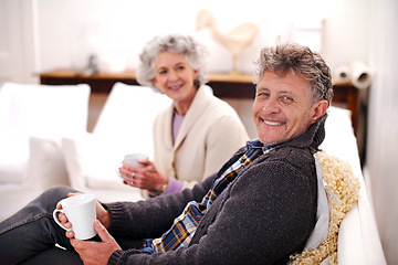 Image showing Portrait, senior couple or coffee to relax on sofa as bonding together in living room in retirement. Older man, woman or tea on couch as morning chat on happiness, love or commitment in marriage