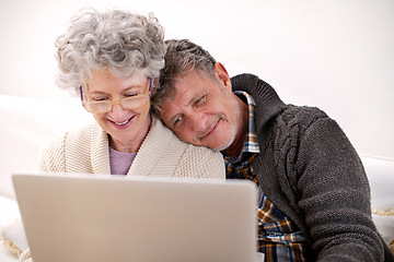 Image showing Laptop, sofa and elderly couple with smile in living room for movie, bonding and love in retirement. Peace, relax and senior people with digital technology for happiness, streaming and enjoyment