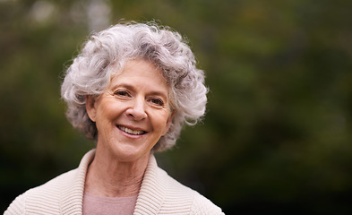 Image showing Senior woman, mockup or portrait with happiness in backyard, garden or patio with copy space and smile. Elderly female person, mature lady or pensioner happy for retirement at home, outdoor or nature