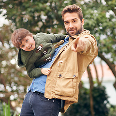 Image showing Father, child and portrait smile for outdoor connection in nature environment for playful, bonding or joyful. Male people, son and face or backyard park as family for childhood, embrace or pointing