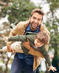 Image showing Father, child and outdoor playing airplane in backyard nature for happiness together, family or game. Male person, son and forest weekend for bonding connection or childhood fun, vacation or love