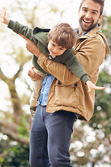 Image showing Portrait, father and happy child play as plane outdoor for bonding, love or care of family laughing together. Dad, kid and airplane game for flying at park, garden and smile of funny parent with boy