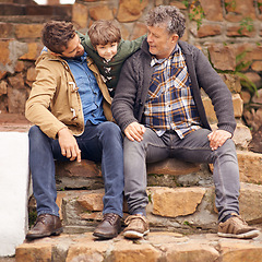 Image showing Child, father and portrait of grandfather outdoor at steps for bonding, care or relax together for love. Family, kid and dad with grandpa, generations and parent embrace boy for healthy support