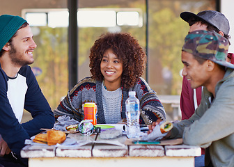 Image showing Friends, group and outdoor table for eating lunch together on backyard patio for bonding, relaxing or connection. Men, women and smile with beverages for community gathering, communication or snack