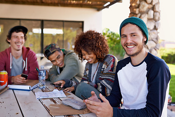 Image showing Friends, group and outdoor lunch or students together on backyard patio for bonding, notes or connection. Men, women and smile with beverages at table for community gathering, communication or snack