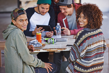 Image showing Portrait, table and university friends at study group with smile, hug and social support in education. Books, tablet and students relax together on patio with diversity, opportunity and college