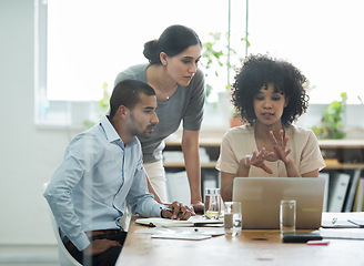 Image showing Business people, company and colleagues with laptop for planning, collaboration and meeting in office. Teamwork, professional and diverse employees on technology for brainstorm, research or documents