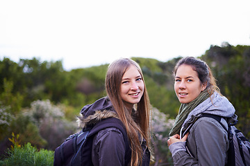 Image showing Portrait, women and hiking in nature for adventure, workout or exercise as fitness routine in forest. People, green plants and trees in Denmark for walking journey in woods or bush in countryside