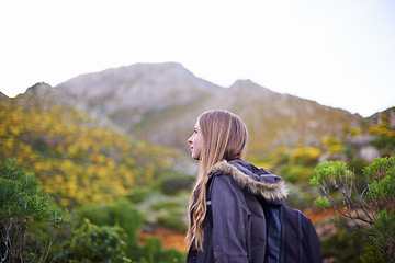 Image showing Woman, hiking and mountain trekking for outdoor exploring for wellness workout, adventure or environment. Female person, bushes and walking in Australia for holiday travel, wilderness or vacation