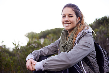 Image showing Portrait, outdoor and hiking with woman, smile and relaxing with stress relief and weekend break with nature. Face, person and hiker with flowers and healthy with wellness and countryside with hobby